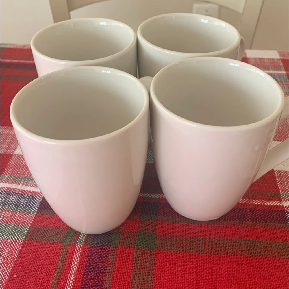 Set of four tea cups by Gibson Home.